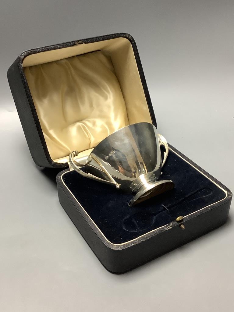 A cased Art Deco silver two handled christening bowl